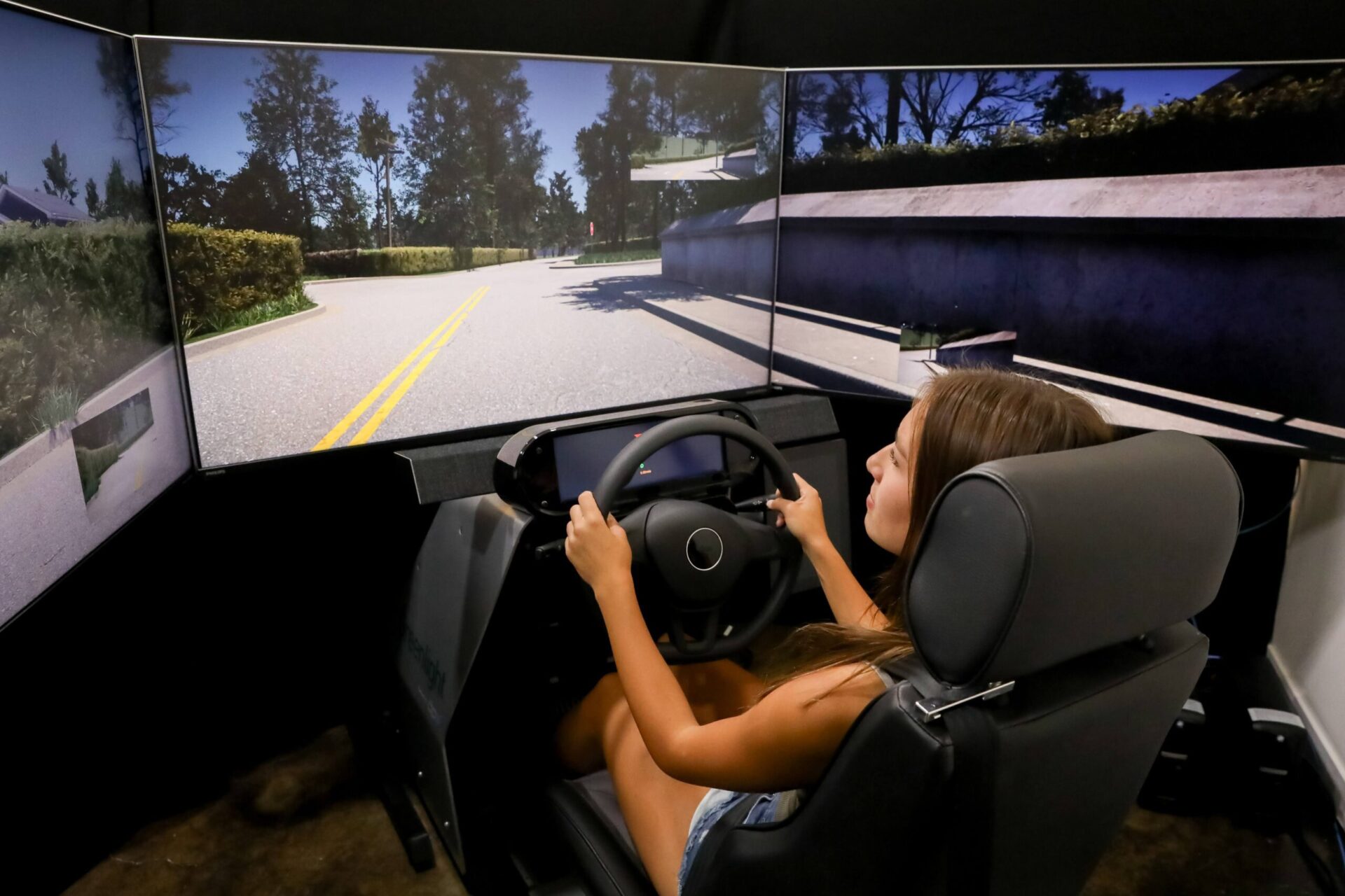 Picture of Girl In Simulator at Greenlight Simulation | Learn To Drive In The Safety Of The Virtual World